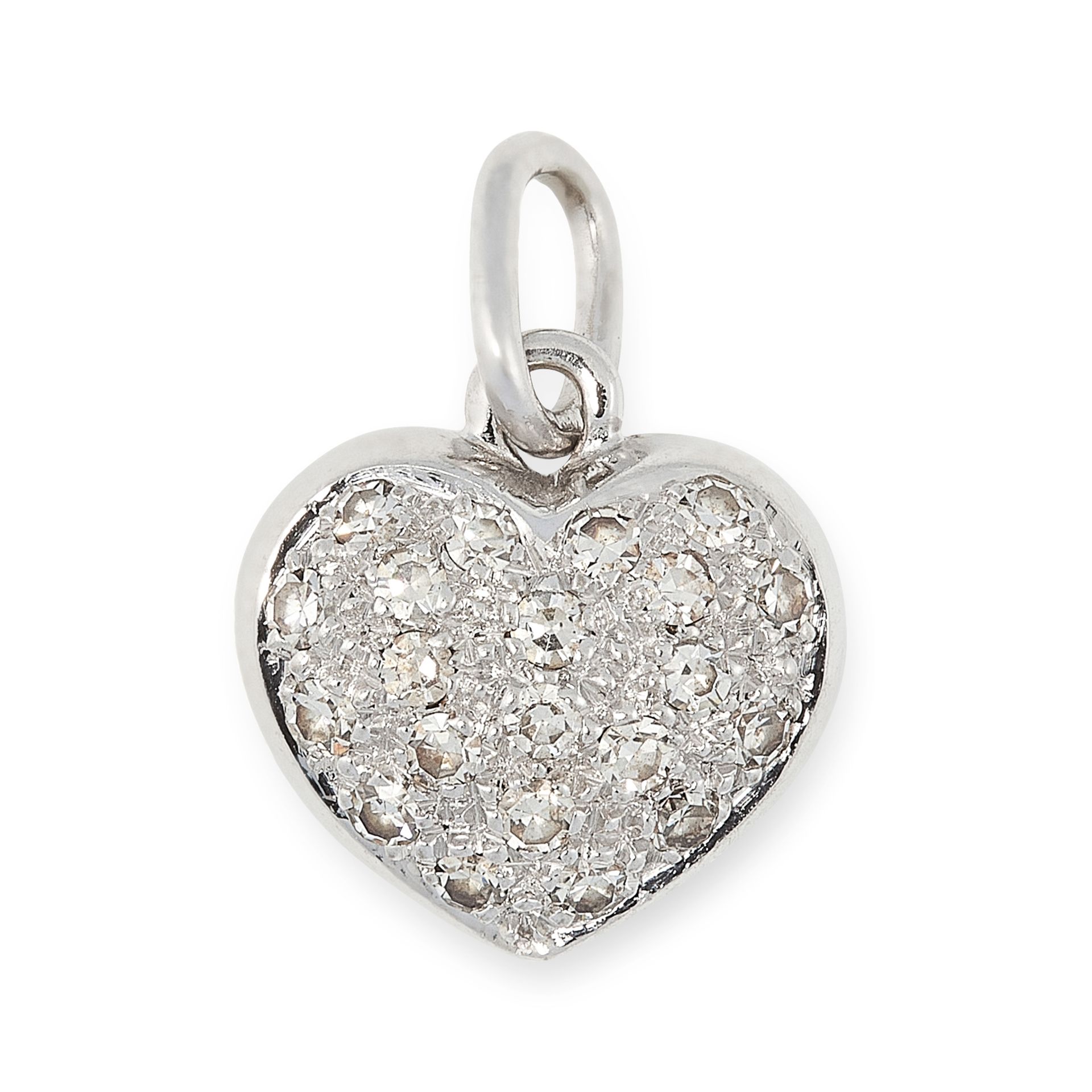 A DIAMOND HEART PENDANT in white gold, designed as a heart, set to one side with a cluster of single