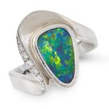 AN OPAL AND DIAMOND DRESS RING in 18ct white gold, set with a pear shaped cabochon opal within a