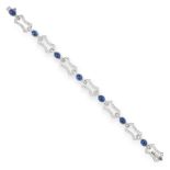 A SAPPHIRE AND DIAMOND BRACELET comprising a row of seven oval cabochon sapphires between stylised