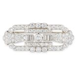 A DIAMOND BROOCH, KOCHERT in platinum, the openwork design set with a principal round cut diamond of