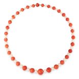 AN ANTIQUE CORAL AND ANGEL CORAL BEAD NECKLACE comprising a single row of sixty-two graduated