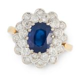 A SAPPHIRE AND DIAMOND CLUSTER RING in 18ct yellow gold, set with an oval cut blue sapphire of 2.