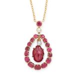 A RUBY AND DIAMOND PENDANT NECKLACE in yellow gold, set with a central Mughal carved ruby of foliate