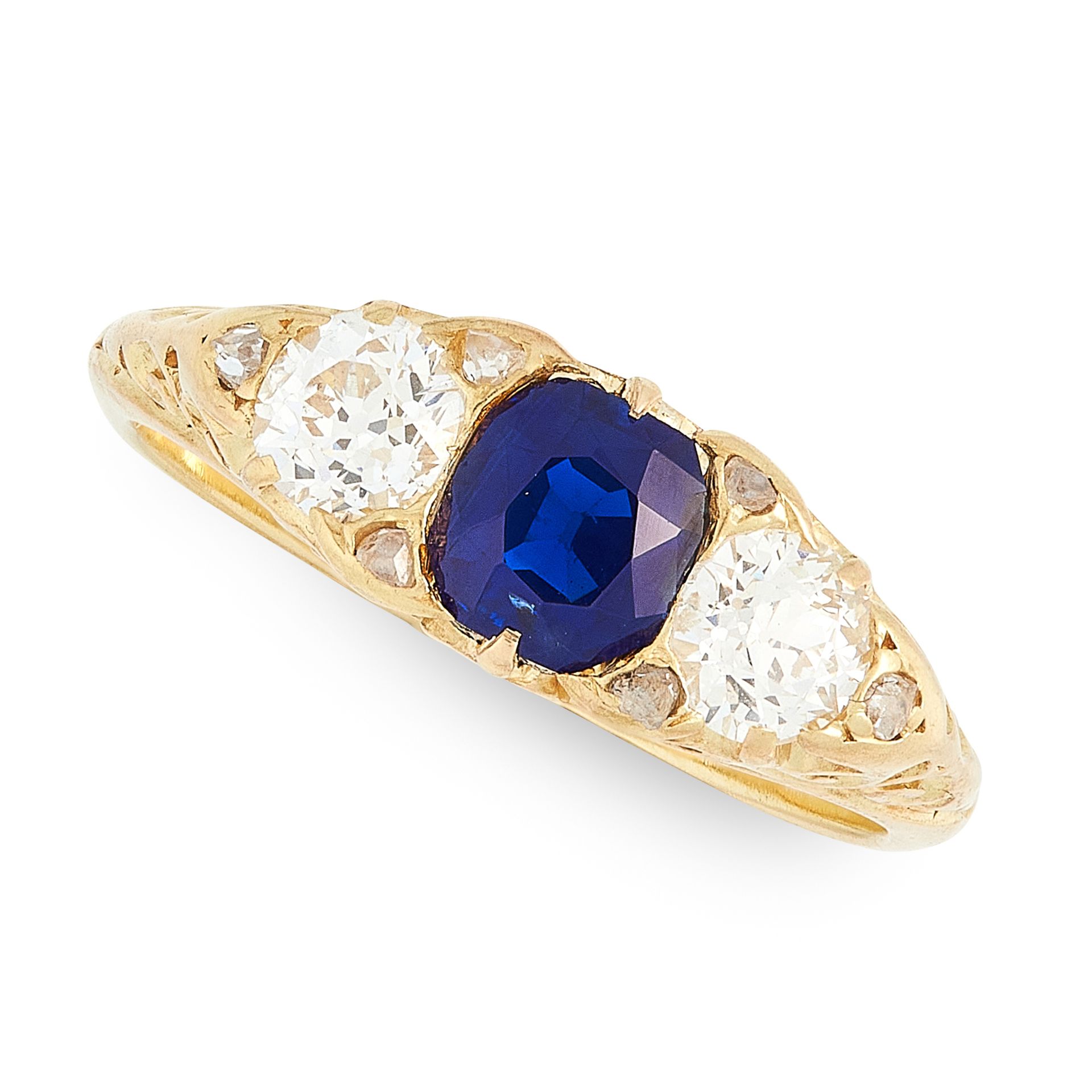 AN ANTIQUE SAPPHIRE AND DIAMOND RING, CIRCA 1900 in high carat yellow gold, set with a cushion cut