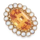 AN ANTIQUE IMPERIAL TOPAZ AND PEARL BROOCH, 19TH CENTURY in yellow gold, set with an oval cut