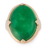 A JADEITE JADE DRESS RING in high carat yellow gold, set with an oval jadeite cabochon of 15.32