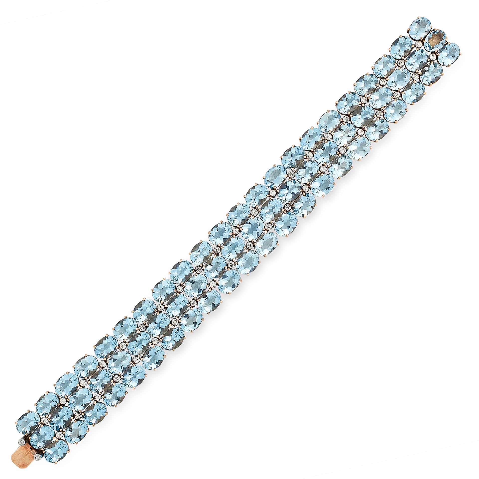 A VINTAGE AQUAMARINE AND DIAMOND BRACELET in yellow gold, comprising three rows of oval cut