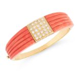 A VINTAGE CORAL AND DIAMOND BANGLE in 18ct yellow gold, the tapering body set with a central