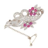 A RUBY AND DIAMOND BROOCH, CIRCA 1950 in 18ct white gold, designed foliate motifs within scrolling