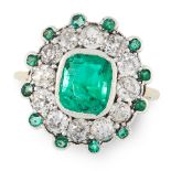A COLOMBIAN EMERALD AND DIAMOND RING set with a cushion cut emerald of 1.54 carats within a border