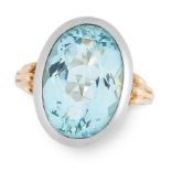 AN AQUAMARINE DRESS RING in white and yellow gold, set with an oval cut aquamarine of 6.77 carats,