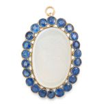 AN ANTIQUE MOONSTONE CAMEO AND SAPPHIRE PENDANT in yellow gold, set with an oval carved moonstone