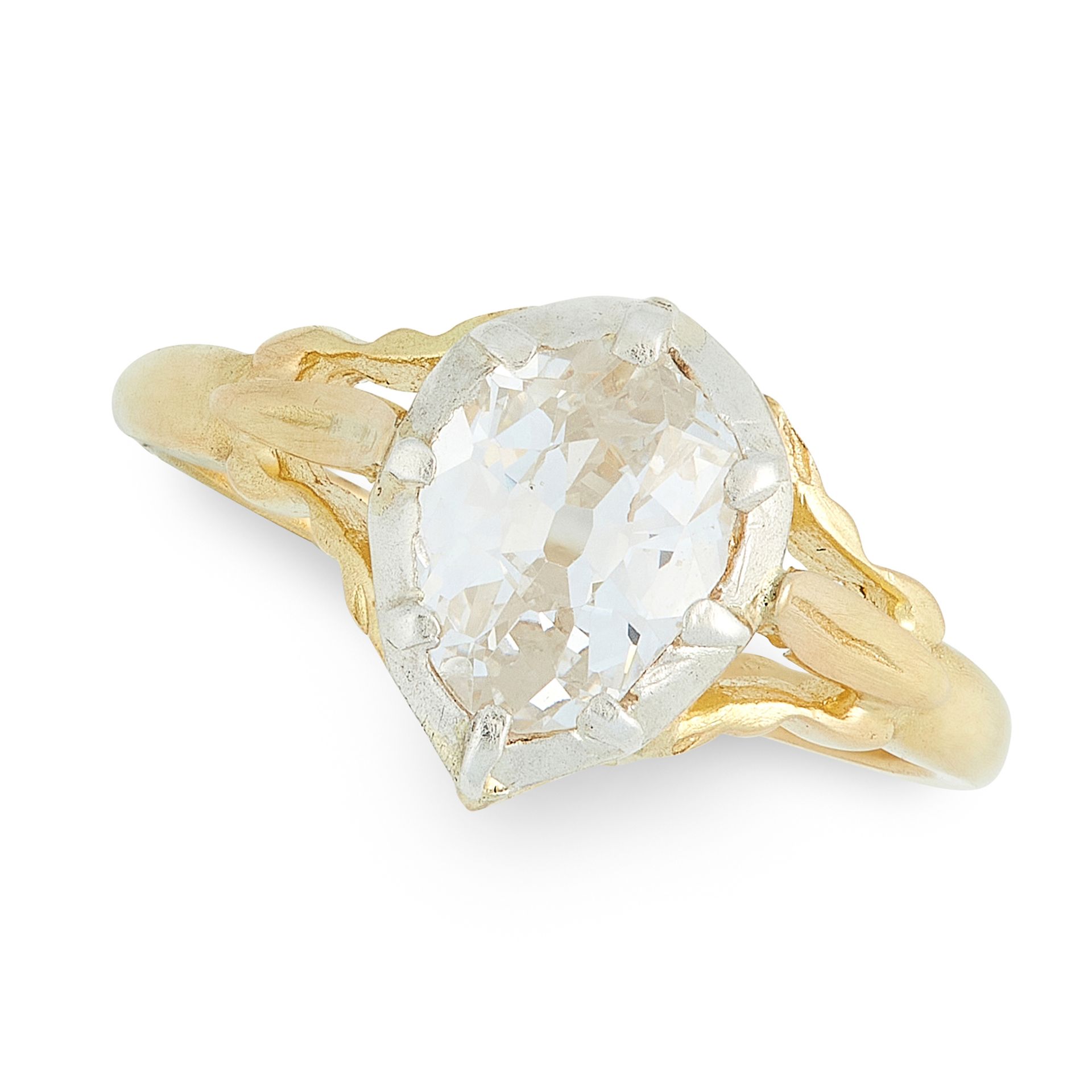 A DIAMOND DRESS RING in high carat yellow gold and silver, in the Georgian style, set with a pear