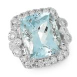 AN AQUAMARINE AND DIAMOND DRESS RING in 18ct white gold, set with a cushion cut aquamarine of 11.