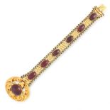 AN ANTIQUE GARNET BRACELET, 19TH CENTURY in high carat yellow gold, set with an oval cabochon garnet