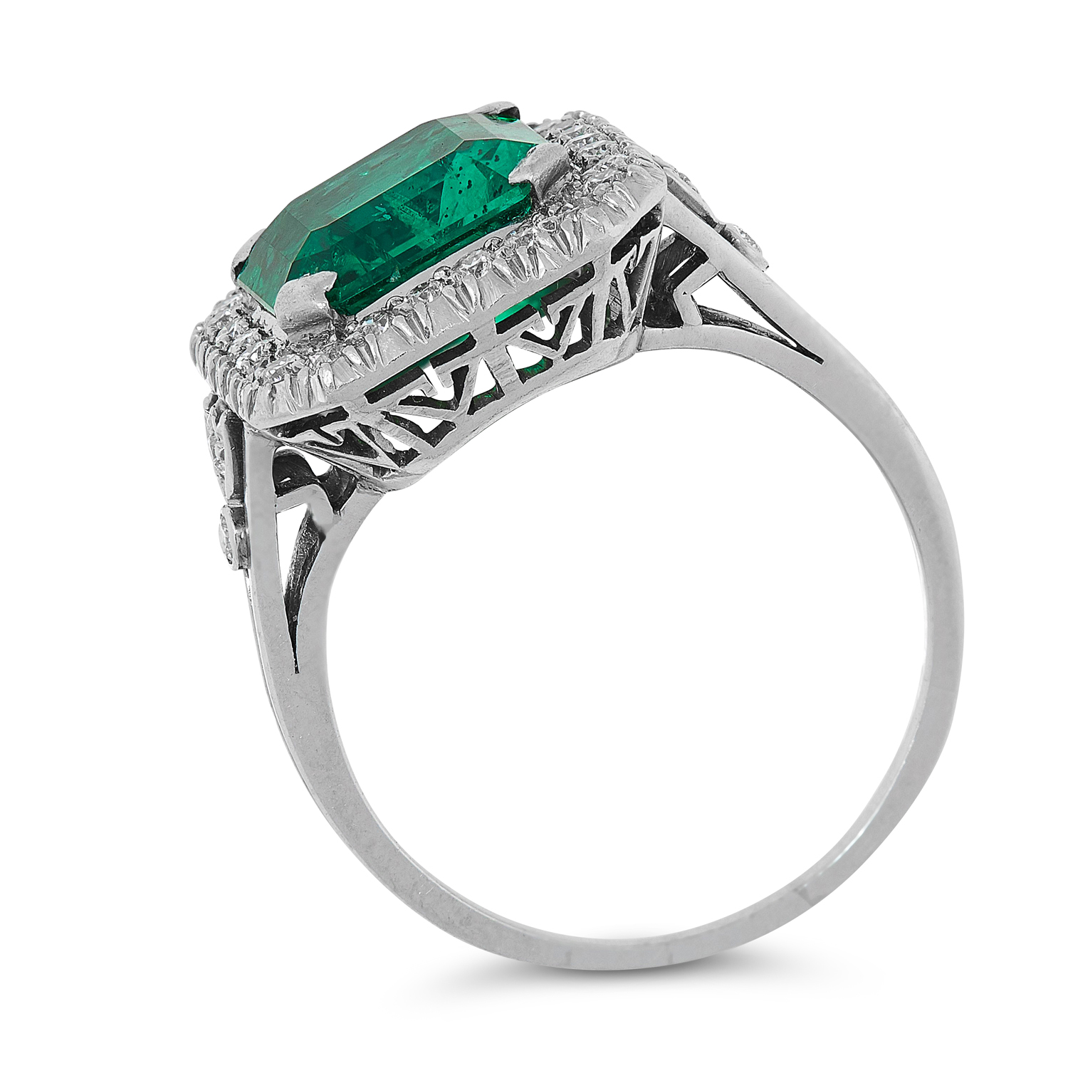 A COLOMBIAN EMERALD AND DIAMOND CLUSTER RING set with an emerald cut emerald of 2.84 carats in a - Image 2 of 2