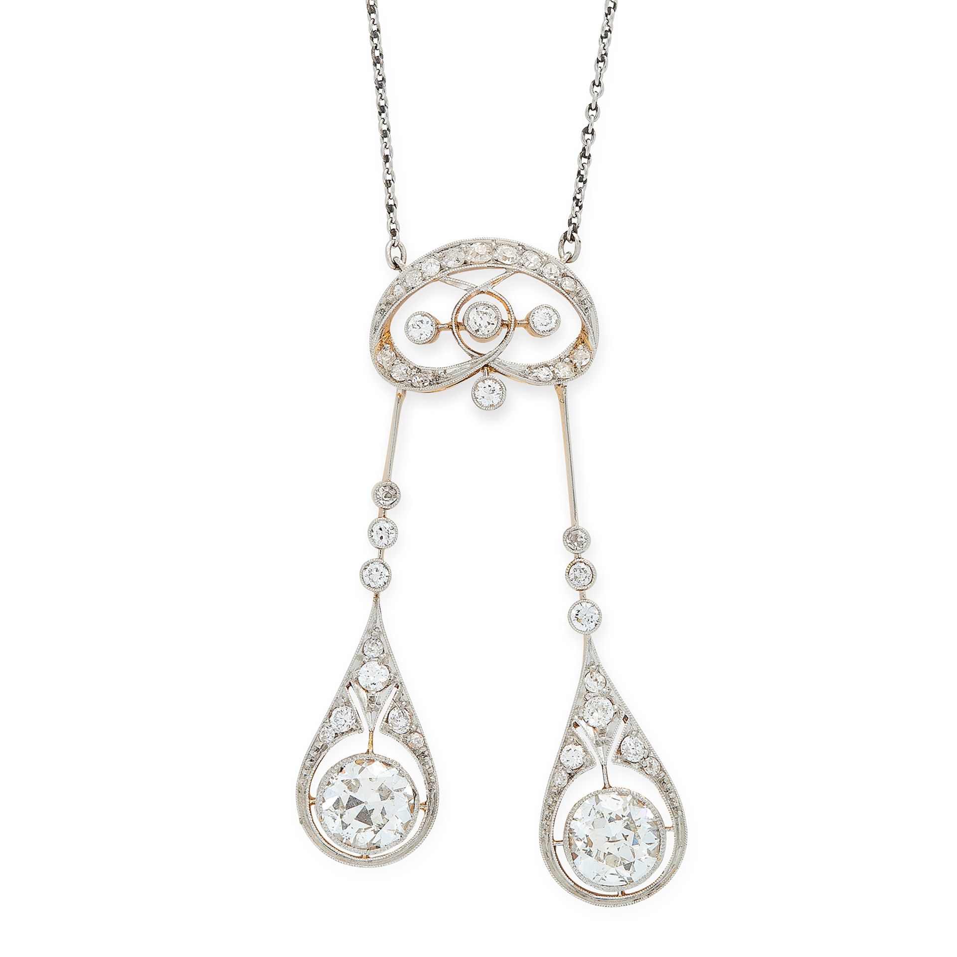 AN ANTIQUE DIAMOND LAVALIER NECKLACE in yellow gold and platinum, the central diamond motif