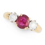 A RUBY AND DIAMOND THREE STONE RING in 18ct yellow gold, set with an oval cut ruby of 1.25 carat,