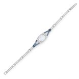 A MOONSTONE, SAPPHIRE AND DIAMOND BRACELET in platinum, set with an oval cabochon moonstone of 7.