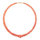 AN ANTIQUE CORAL BEAD NECKLACE comprising a single row of ninety-five graduated coral beads