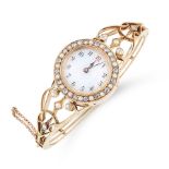 AN ANTIQUE PEARL, DIAMOND AND ENAMEL WATCH BANGLE in yellow gold, the openwork bangle with scrolling