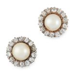 A PAIR OF NATURAL PEARL AND DIAMOND STUD EARRINGS each set with a pearl of 7.1 and 6.7mm, within