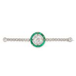A DIAMOND AND EMERALD BROOCH, CIRCA 1930 set with an old cut diamond of 1.19 carats within a