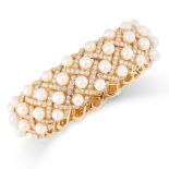 A PEARL AND DIAMOND MATELASSE BRACELET BANGLE, CHANEL in 18ct yellow gold, the articulated body of