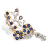 A SAPPHIRE AND DIAMOND BROOCH in yellow gold and silver, designed as a floral spray, the flowers