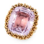 AN ANTIQUE PINK TOPAZ RING in 18ct yellow gold, set with a cushion cut pink topaz of 20.25 carats