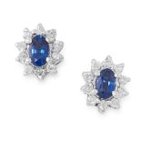 A PAIR OF SAPPHIRE AND DIAMOND STUD EARRINGS in 18ct white gold, set with oval cut blue sapphires