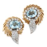 A PAIR OF VINTAGE AQUAMARINE AND DIAMOND EARRINGS in 18ct yellow gold, each set with an oval cut