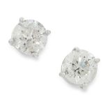 A PAIR OF DIAMOND STUD EARRINGS in 18ct white gold, each set with a round cut diamond, totalling 1.