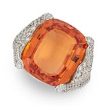 AN IMPERIAL TOPAZ AND DIAMOND RING, HENNELL in 18ct white gold, set with a cushion cut imperial