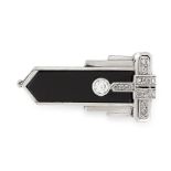 AN ONYX AND DIAMOND CLIP BROOCH CIRCA 1940 in 18ct white gold, the tapering geometric body set