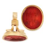 AN ANTIQUE CARNELIAN INTAGLIO FOB SEAL, 19TH CENTURY in yellow gold, set with a large oval