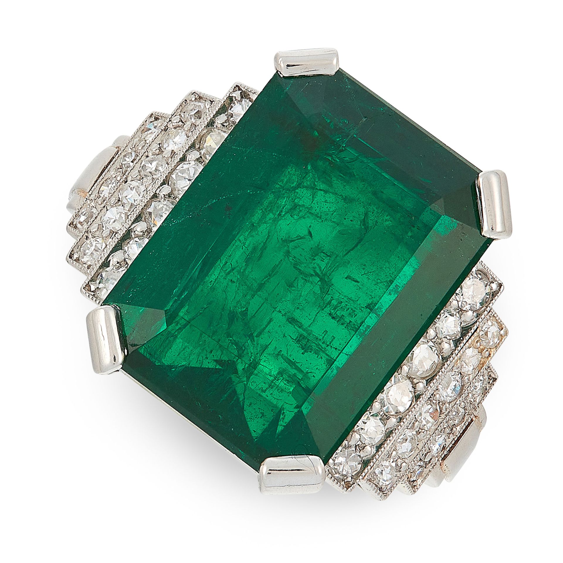 AN ART DECO EMERALD AND DIAMOND RING in platinum, set with an emerald cut emerald of 10.26 carats,