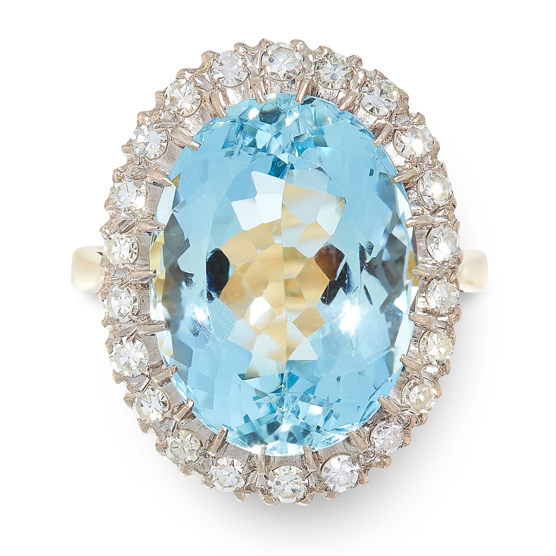 AN AQUAMARINE AND DIAMOND DRESS RING in 18ct yellow and white gold, set with an oval cut