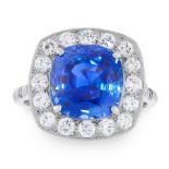 AN UNHEATED SAPPHIRE AND DIAMOND RING in platinum, set with a cushion cut sapphire of 5.82 carats,