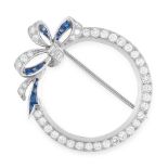 A VINTAGE SAPPHIRE AND DIAMOND BROOCH CIRCA 1950 in platinum, of circular form, accented by a ribbon