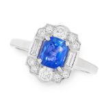 A SAPPHIRE AND DIAMOND DRESS RING in platinum, set with a cushion cut sapphire of 1.03 carats,
