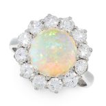 A VINTAGE OPAL AND DIAMOND RING in 18ct white gold, set with an oval cabochon opal of 1.85 carats,