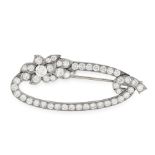 A VINTAGE DIAMOND BROOCH in platinum, of oval form, set allover with round cut diamonds, accented by