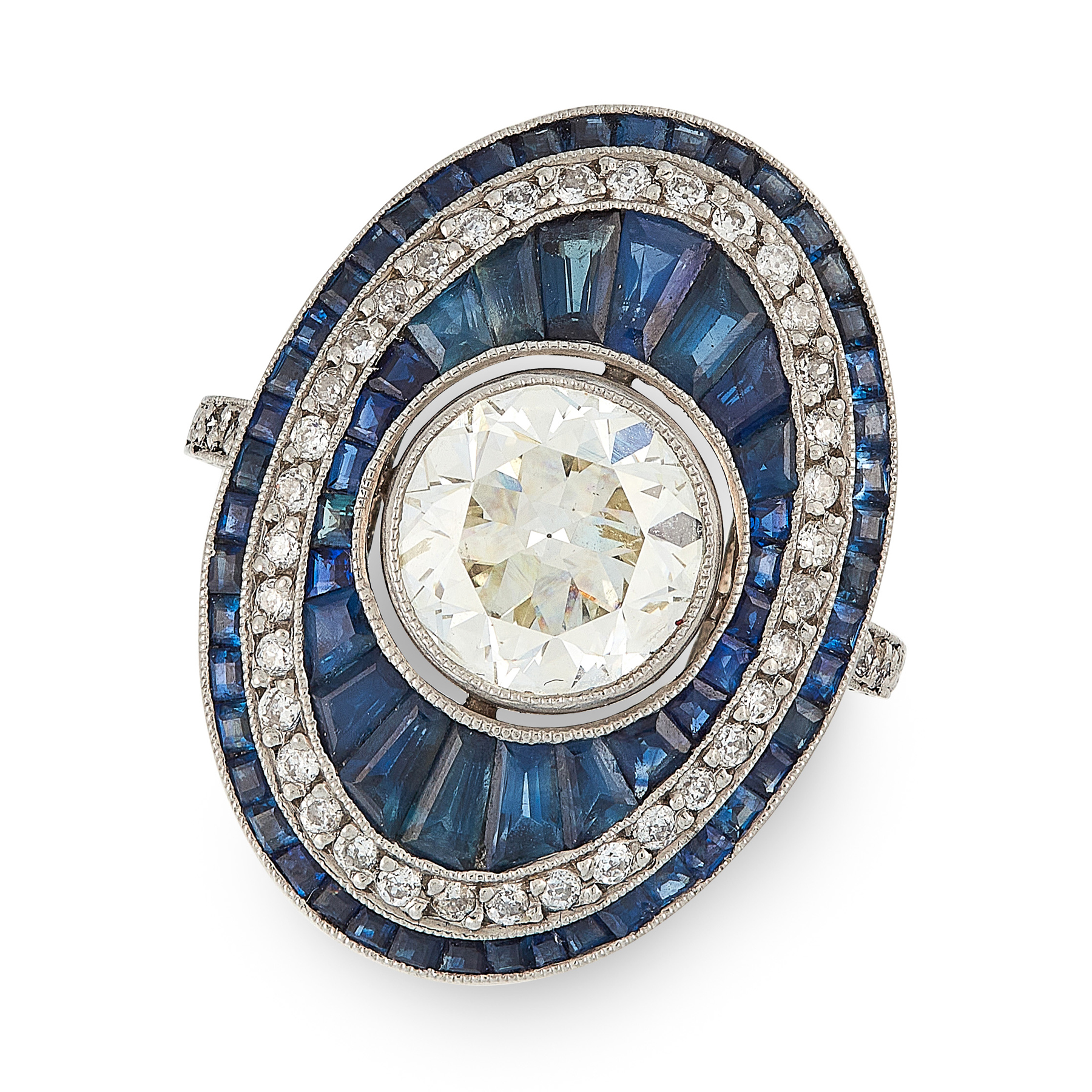 A DIAMOND AND SAPPHIRE DRESS RING in platinum, in Art Deco design, the oval face set with an old