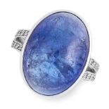 A TANZANITE AND DIAMOND RING in 18ct white gold, set with an oval cabochon tanzanite of 22.13