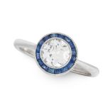 A DIAMOND AND SAPPHIRE TARGET RING set with an old cut diamond of 0.87 carats within a border of