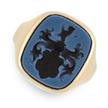 A HARDSTONE INTAGLIO SEAL SIGNET RING in 14ct yellow gold, the cushion shaped face set with a
