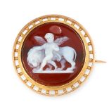 AN ANTIQUE CARVED HARDSTONE BROOCH, 19TH CENTURY in high carat yellow gold, set with a circular