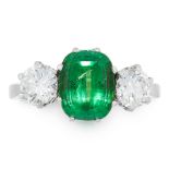 A TSAVORITE GARNET AND DIAMOND RING in platinum, set with a cushion cut green tsavorite grossular