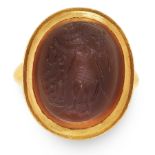 AN ANTIQUE GNOSTIC ABRAXAS INTAGLIO RING in 18ct yellow gold, set with a large oval hardstone,